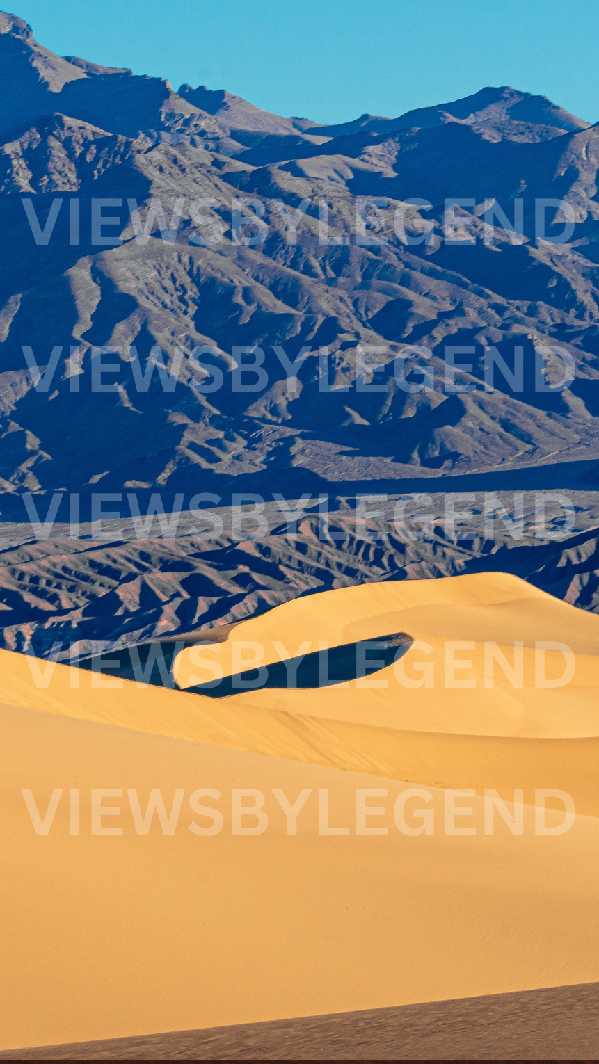 Wallpaper Wednesday: Golden Waves and Rocky Giants